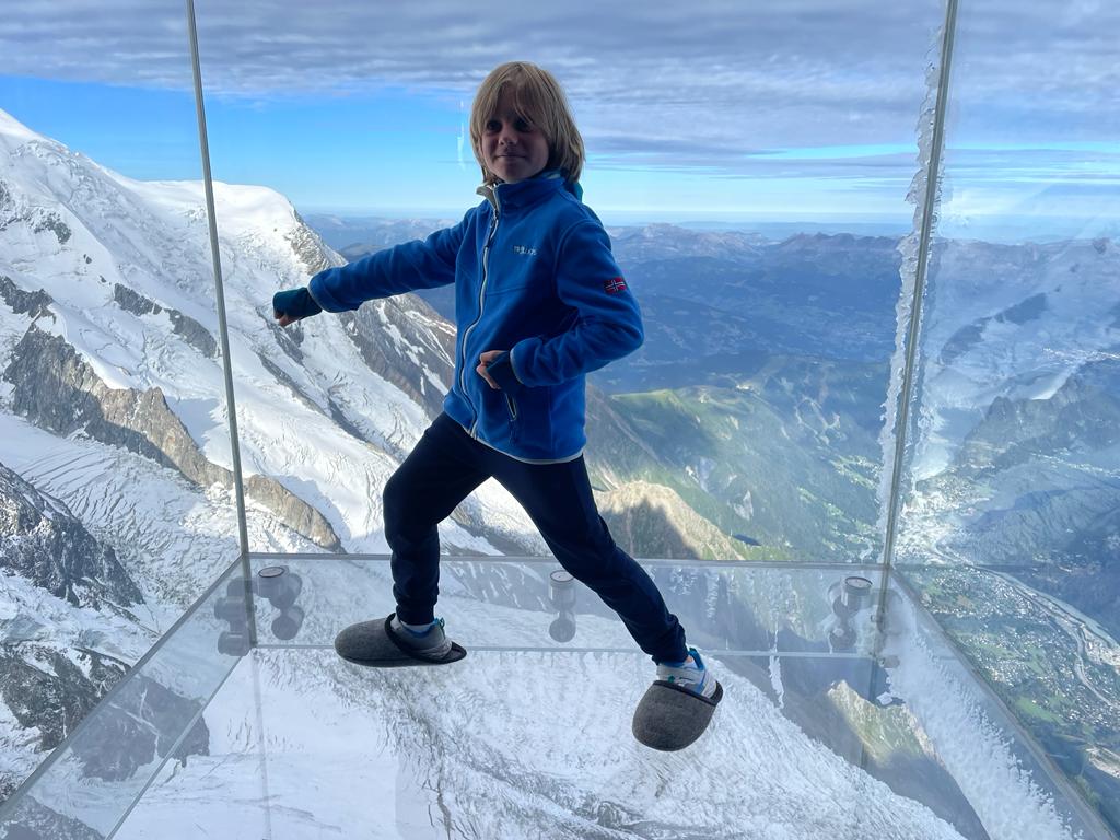 Aleks on the top of Europe practicing karate with the rising sun. 3842m high on Chamonix Mont Blanc